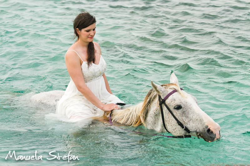 Bride riding horse in Jamaica